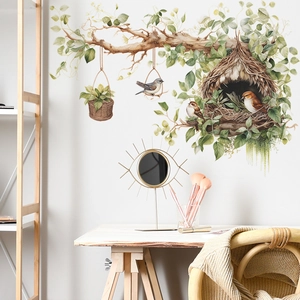 Self-adhesive wall sticker featuring tree branch, bird nest, and green hanging basket decor