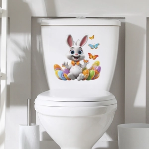 Detail showing cartoon Easter bunny and colorful eggs on a white ceramic toilet tank