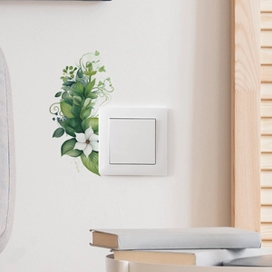 Selbstklebende Wandsticker mit tropischen grünen Blättern und einer weißen Blume für Schalter