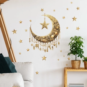 Detail view of gold 3D embossed moon and star wall stickers set on white wall