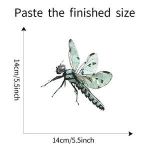 Detailed view of green dragonfly wall sticker with scale markings showing 14cm x 14cm size