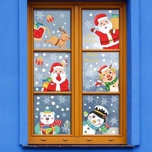 Festive Christmas window cling set with Santa, reindeer, and snowman on glass window