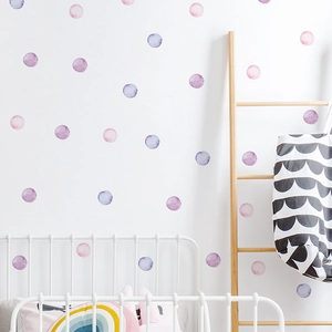 Nursery wall stickers with watercolor polka dots in soft pastel colors for bedroom decor