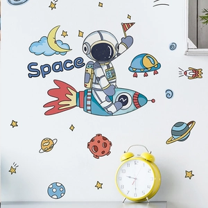 Cartoon astronaut and rocket space wall stickers for kids room decor on white wall