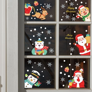 Christmas window decals set featuring Santa, reindeer, and snowflakes on glass panes
