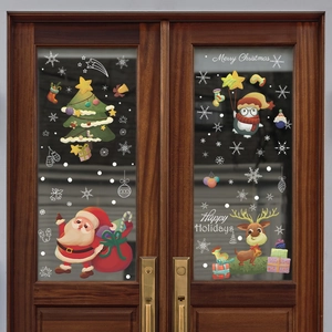 Christmas window decals set featuring Santa, reindeer and tree on glass door