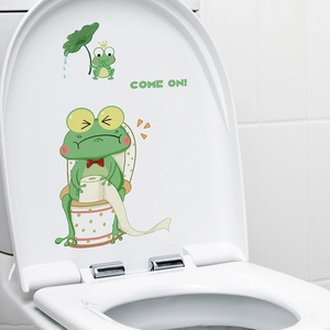 Self-adhesive cartoon frog toilet sticker with crown and leaf for bathroom wall decor