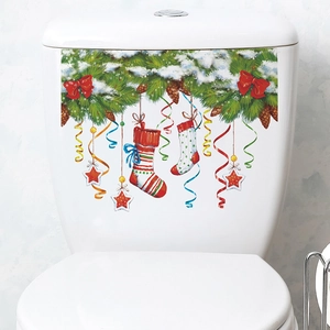 Sticker de toilette de Noël avec branches de sapin, neige et chaussettes de fête
