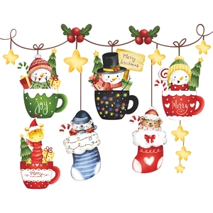 Close-up of Christmas stickers featuring snowman, stocking and reindeer illustrations