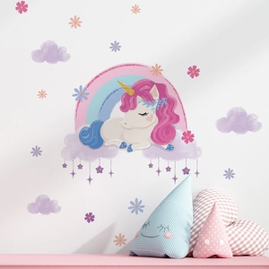 Cartoon unicorn wall decal with rainbow and stars for cozy children's room decoration