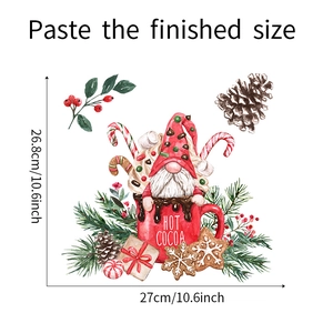 Detail of Christmas gnome wall sticker in hot cocoa mug with pine cones and berries