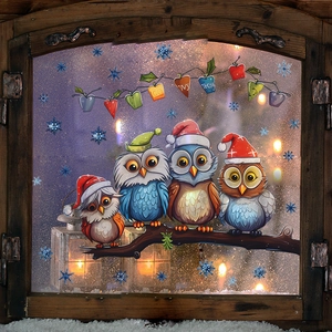 Christmas window stickers with owls on branches, snowflakes and colorful bunting decor