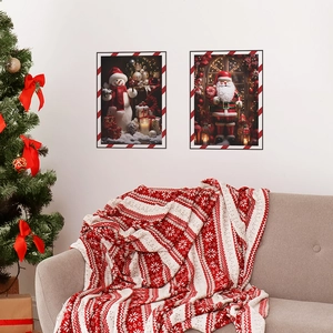 Detailed view of festive Christmas blanket with snowflake patterns on grey sofa
