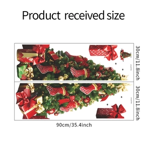 Detailed view of two 90x30cm Christmas wall decals with tree, socks and gifts