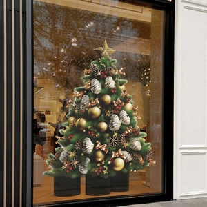 Détail d'un sticker mural sapin de Noël avec pommes de pin et ornements dorés