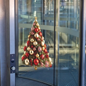 Christmas tree wall sticker with gold and red baubles on a glass door for festive decoration