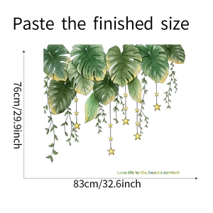 Detail showing tropical green leaf wall decals with dimensions 83cm wide and 76cm high