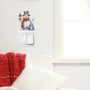 Cute snowman and penguin wall sticker for light switch in cozy living room decor