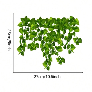 Detailed size specifications of green plant wall sticker measuring 23cm by 27cm