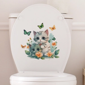 Cute cartoon cats and orange flowers self-adhesive wall sticker on a white toilet lid
