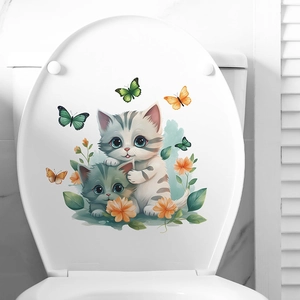 Cartoon cats and flowers wall sticker on a white toilet lid for home decoration