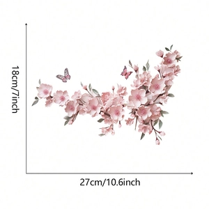 Detailed view of pink cherry blossom and butterfly wall decals with dimensions 27x18cm