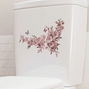 Watercolor pink cherry blossom and butterfly self-adhesive wall stickers on toilet tank