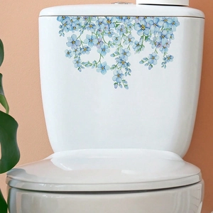 Self-adhesive blue flower bathroom wall stickers on white toilet tank with watercolor design