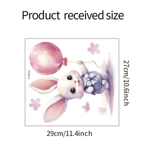 Detail view of cartoon bunny wall sticker with balloon showing 29cm x 27cm dimensions