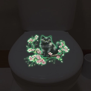 Luminous wall sticker featuring a black cat and cherry blossoms for bathroom decor