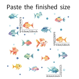 Detailed view of colorful cartoon fish wall decals with specific size measurements in cm and inches