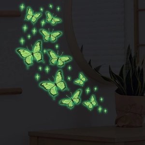 Autocollants muraux papillon et étoile fluorescents illuminant une chambre d'enfant