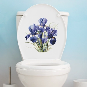 Detailed view of purple iris flower wall stickers applied on a white toilet lid
