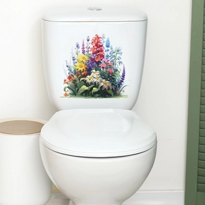 Macro detail of tropical floral decals with colorful blooms on a white toilet tank surface