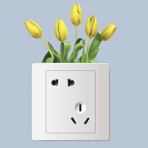 White five-hole wall socket decorated with yellow tulips against a blue background