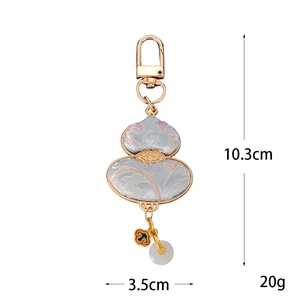 Handmade Chinese style light blue gourd charm with floral pattern and golden trim detail