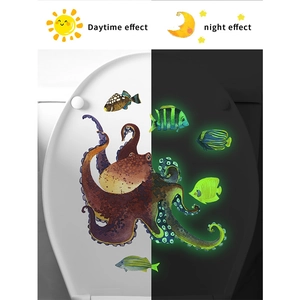 Luminous octopus and fish wall stickers showing daytime color and nighttime glow effect