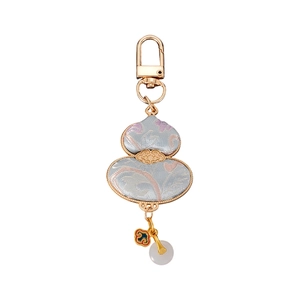 Traditional Chinese light blue brocade gourd pendant with golden hook and white jade bead