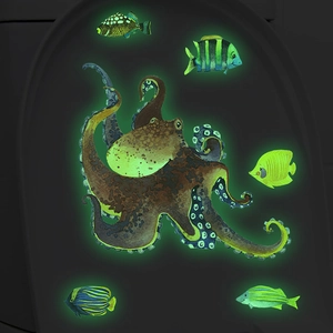 Glow in the dark ocean wall stickers featuring luminous octopus and tropical fish