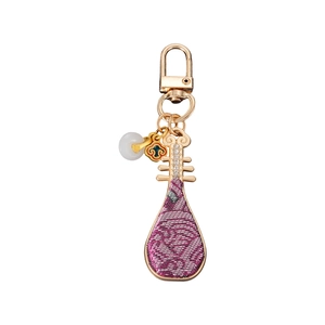Exquisite gold and purple Chinese lute keychain with jade-like bead and cloud pendant