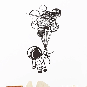 Minimalist astronaut holding planet balloons wall decal sticker for modern home nursery decor