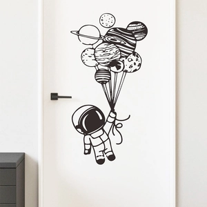 Minimalist astronaut holding planet balloons wall sticker for kids bedroom decor