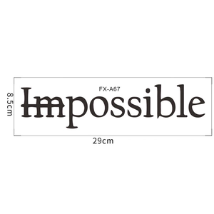Close-up of inspirational wall sticker showing Impossible changed to Possible with markings