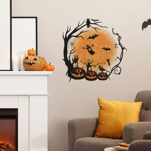 Halloween wall sticker featuring pumpkins and ghosts on a wall next to a cozy fireplace