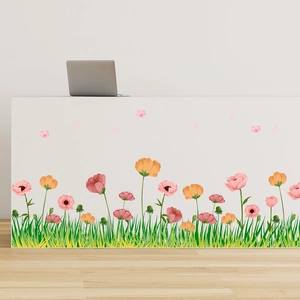 Self-adhesive floral wall sticker featuring colorful flowers and green grass for home decor