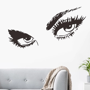 Minimalist female eyes wall sticker as modern home decor for living room above sofa