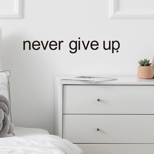 Sticker mural noir 'Never Give Up' en vinyle pour une déco de chambre moderne