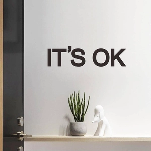Minimalist 'IT'S OK' wall sticker in black bold font for modern bedroom and office decor
