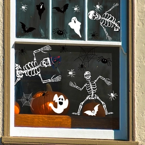 Halloween window decals set featuring skeletons, bats, and spiders for festive home decor