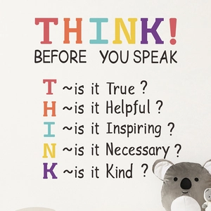 Colorful THINK classroom wall decal with motivational phrases on white wall